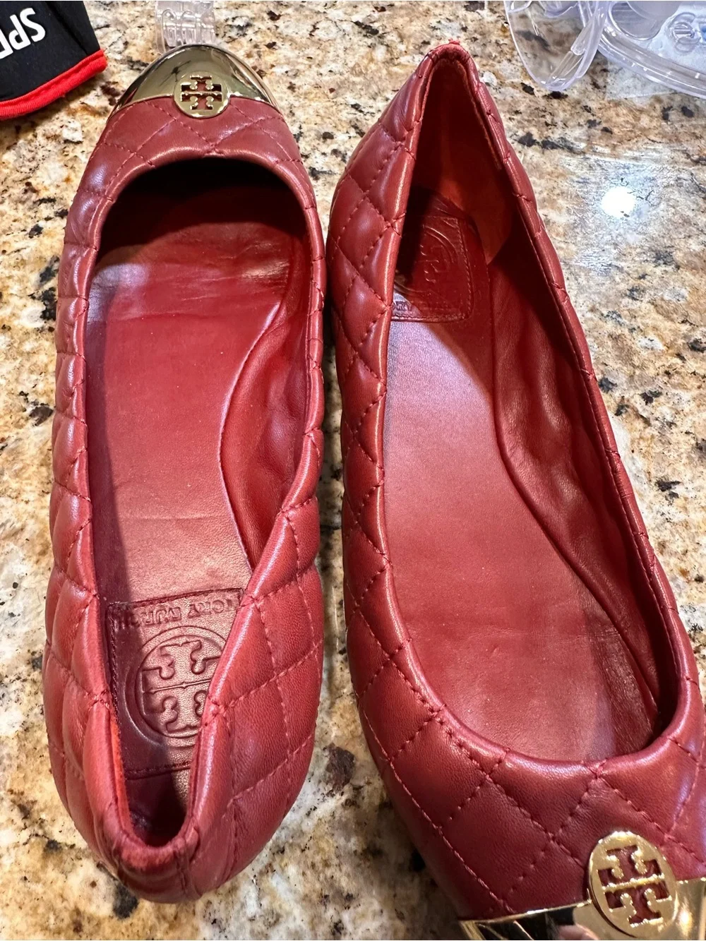 Tory Burch Quilted Wine Leather Ballet Flats with Gold Cap Toe